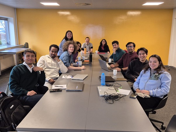 A group of students around a table
